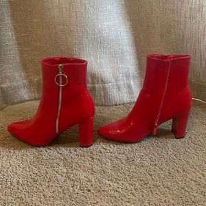 Red patent leather heeled booties